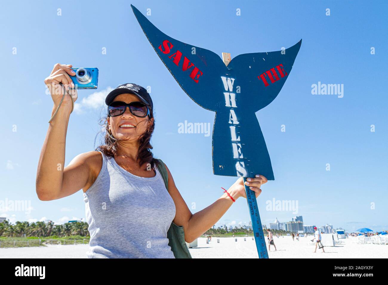 Miami Beach Florida,Greenpeace,demonstration,protest,Save the Whales,sign,logo,supporter,Hispanic Latin Latino ethnic immigrant immigrants minority,ad Stock Photo