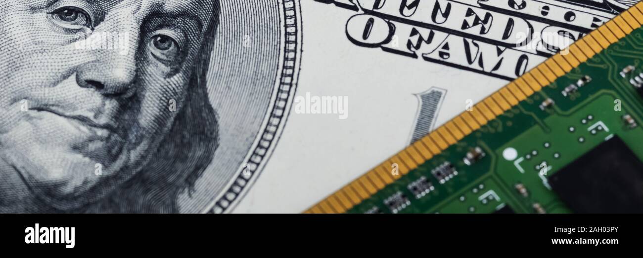 Computer board and one hundred dollars bill closeup Stock Photo Alamy