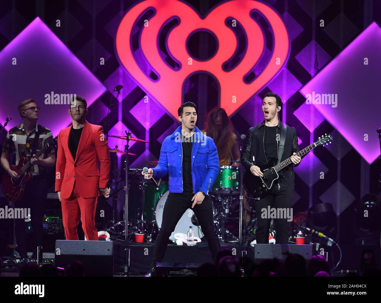 Sunrise FL, USA. 22nd Dec, 2019. The Jonas Brothers perform during Y100 Jingle Ball 2019 at The BB&T Center on December 22, 2019 in Sunrise, Florida. Credit: Mpi04/Media Punch/Alamy Live News Stock Photo