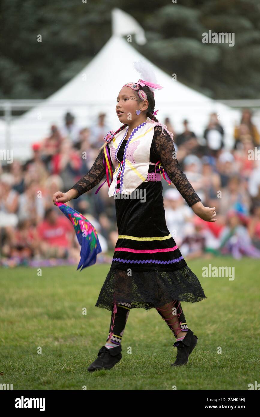 Female indigenous dancer at Canada Day powwow. Stock Photo