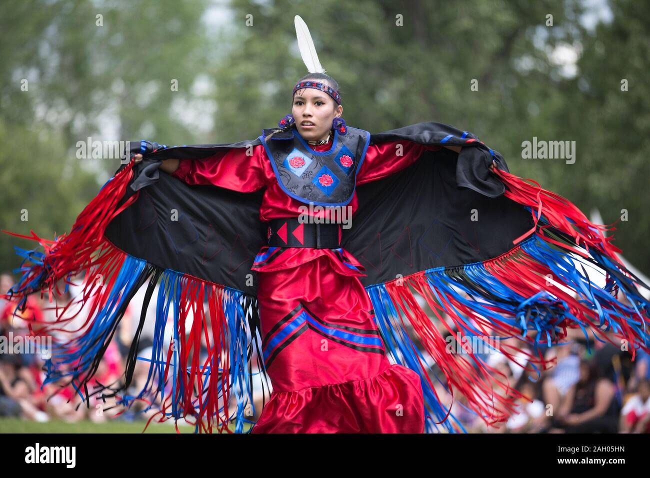 Female indigenous dancer at Canada Day powwow. Stock Photo