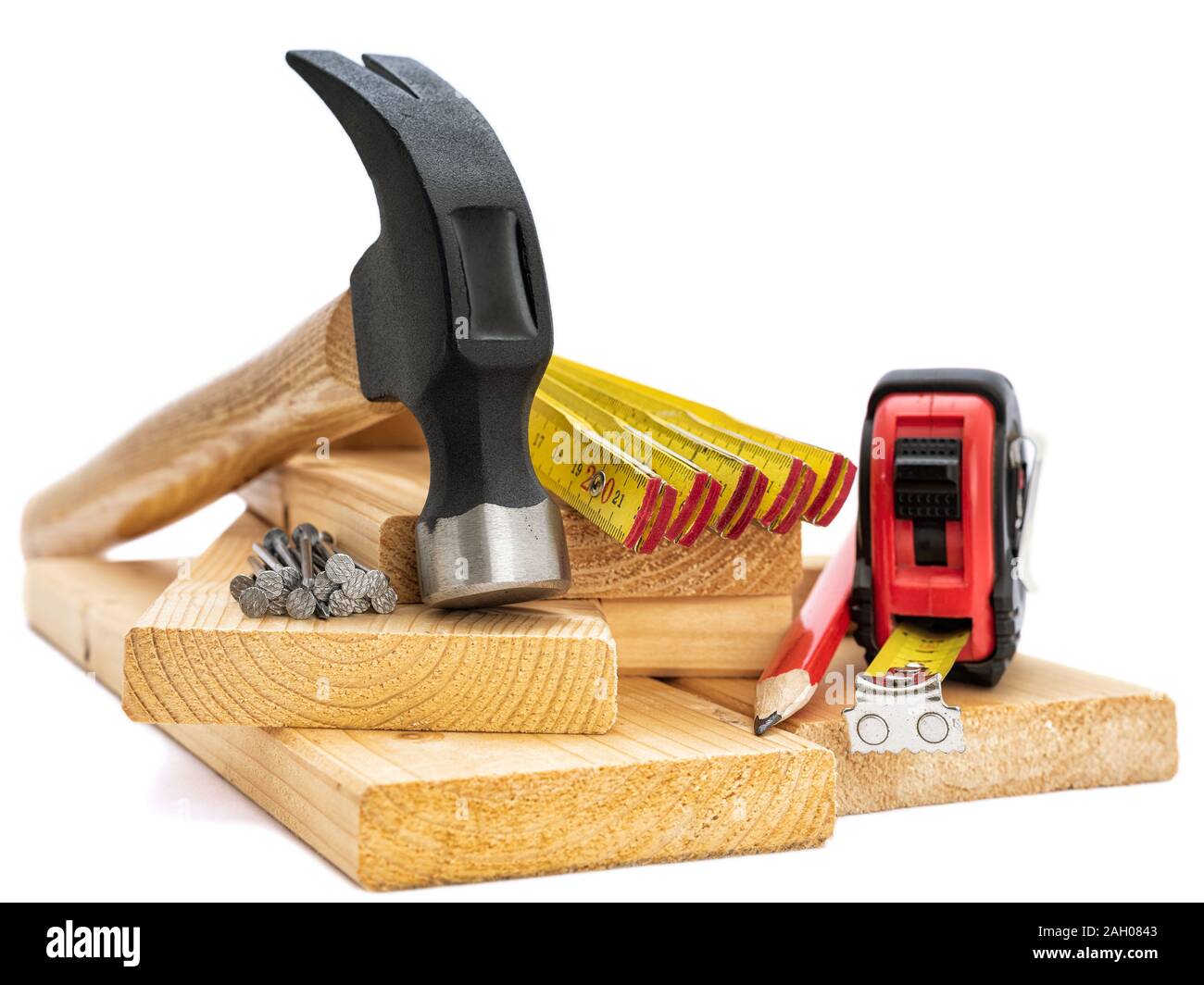 Close-up of hammer and carpenter's tools on a white background. Construction industry, do it yourself. Stock Photo
