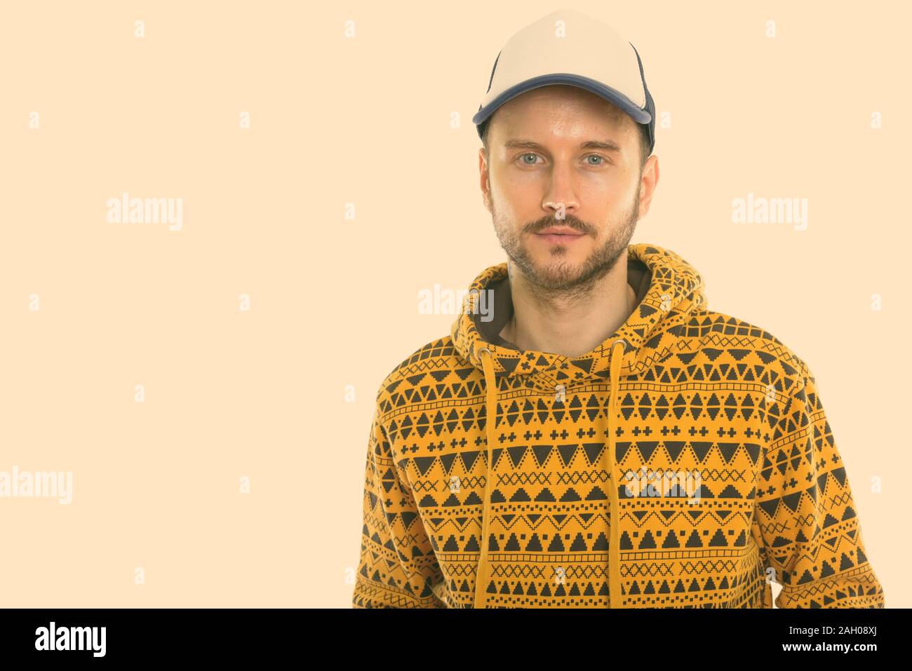 Studio shot of young man wearing hat Stock Photo