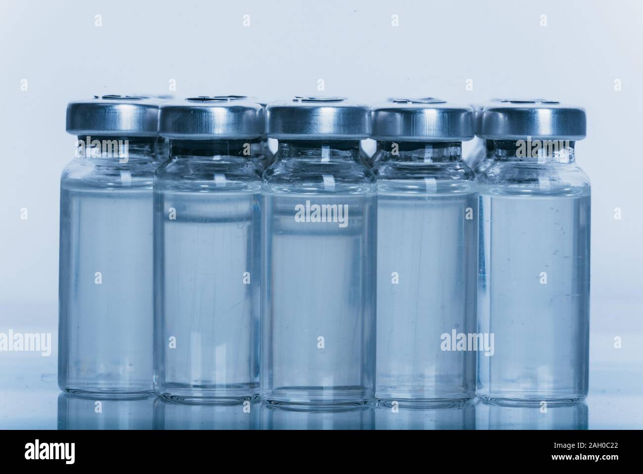 Glass medical ampoule vial for injection. Medicine is dry white drug ...