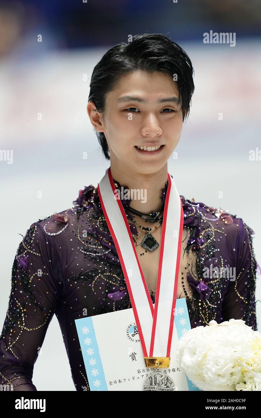 2nd placed Yuzuru Hanyu celebrates during the Japan Figure Skating