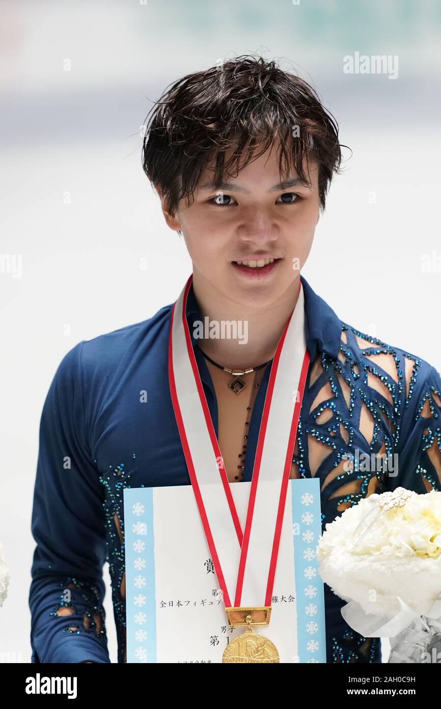 Winner Shoma Uno celebrates during the Japan Figure Skating