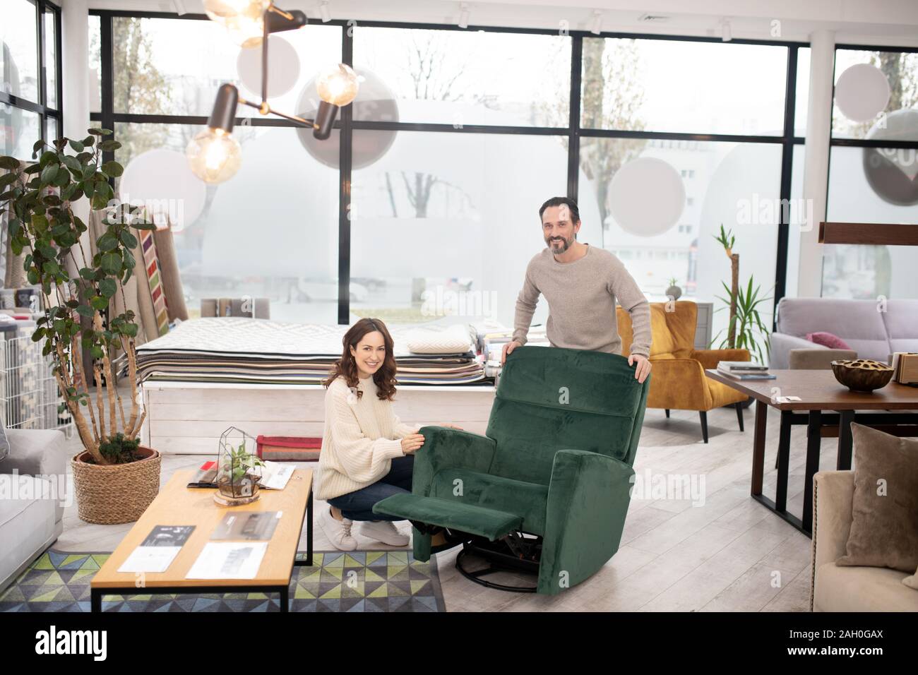 Man in green armchair hires stock photography and images Alamy