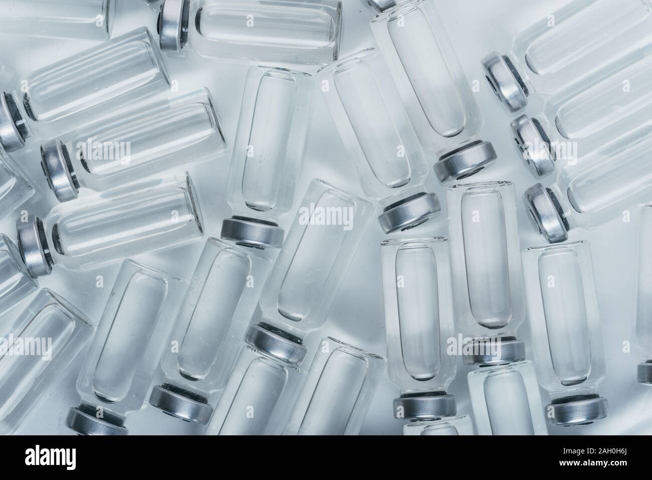 Glass medical ampoule vial for injection. Medicine is dry white drug ...