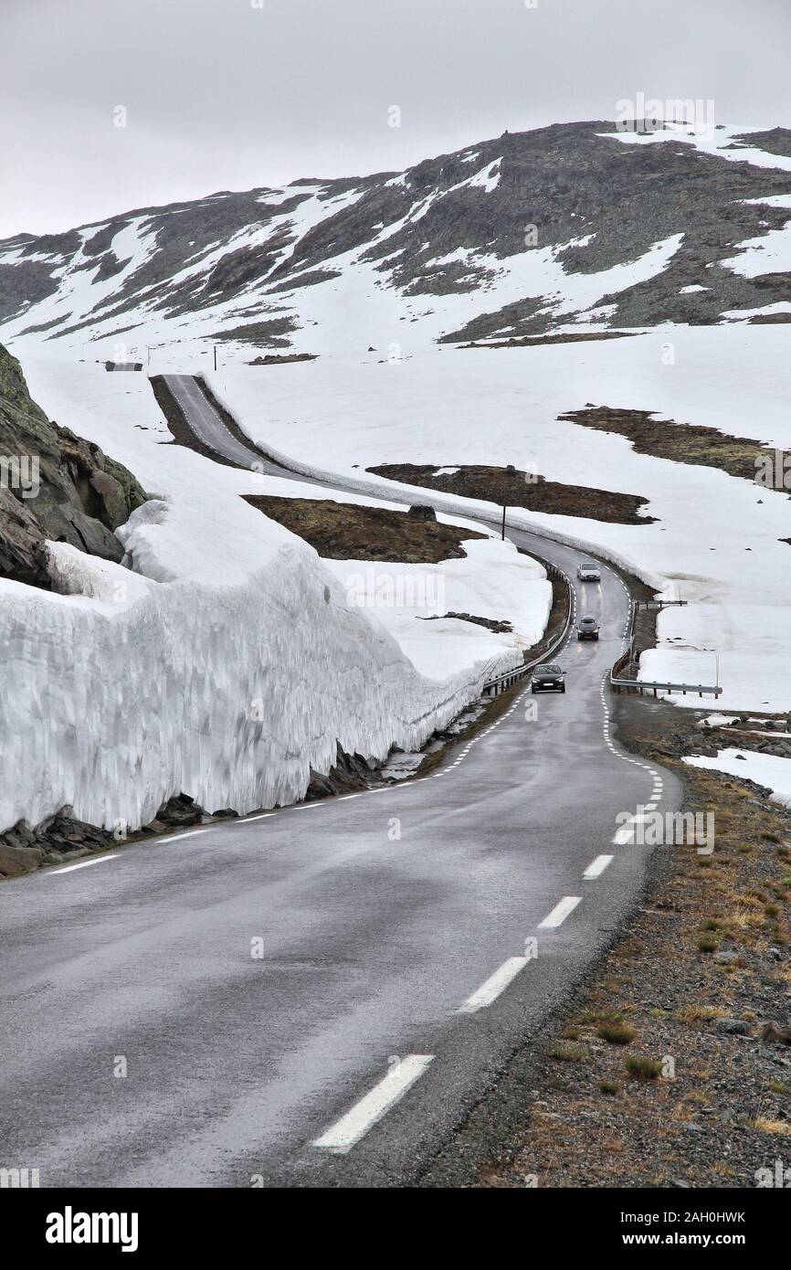 Snow Road in Norway - national tourist road across the Aurland mountain (Aurlandsfjellet). Summer view in July. Stock Photo