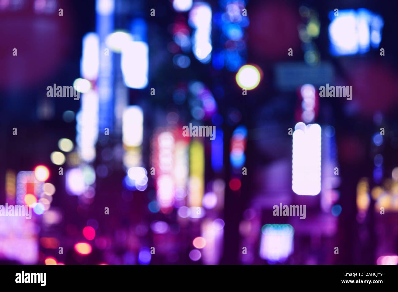 Abstract city lights background. Blurred defocused night neons in Tokyo,  Japan Stock Photo - Alamy