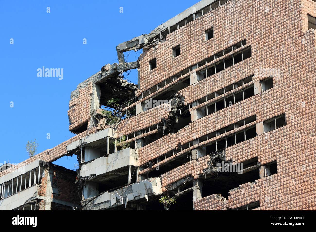 BELGRADE, SERBIA - AUGUST 15, 2012: War destruction in Belgrade, Serbia. The Yugoslav Ministry of Defence building was bombed and damaged in 1999 by N Stock Photo