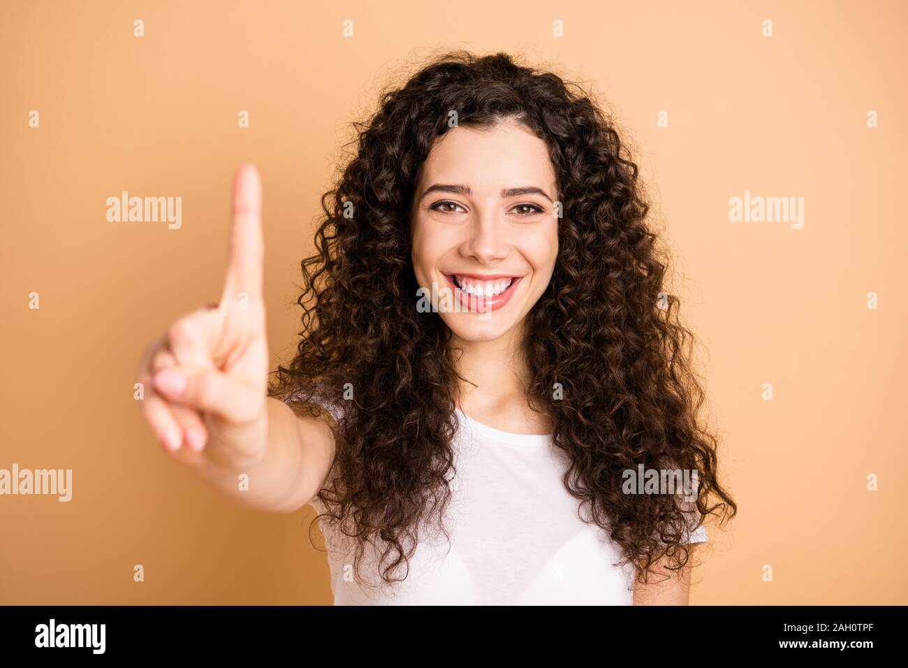 Closeup Photo Of Amazing Lady Raising Hand Showing One Index Finger Starting Countdown Wear