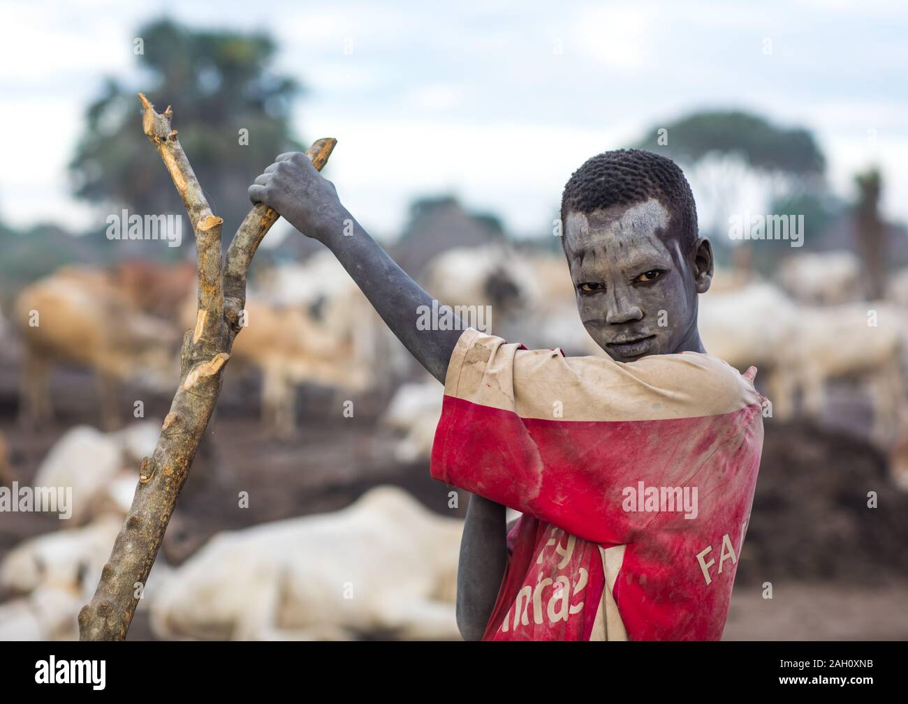 Mundari tribe boy covered in ash to protect from the mosquitoes and flies, Central Equatoria, Terekeka, South Sudan Stock Photo