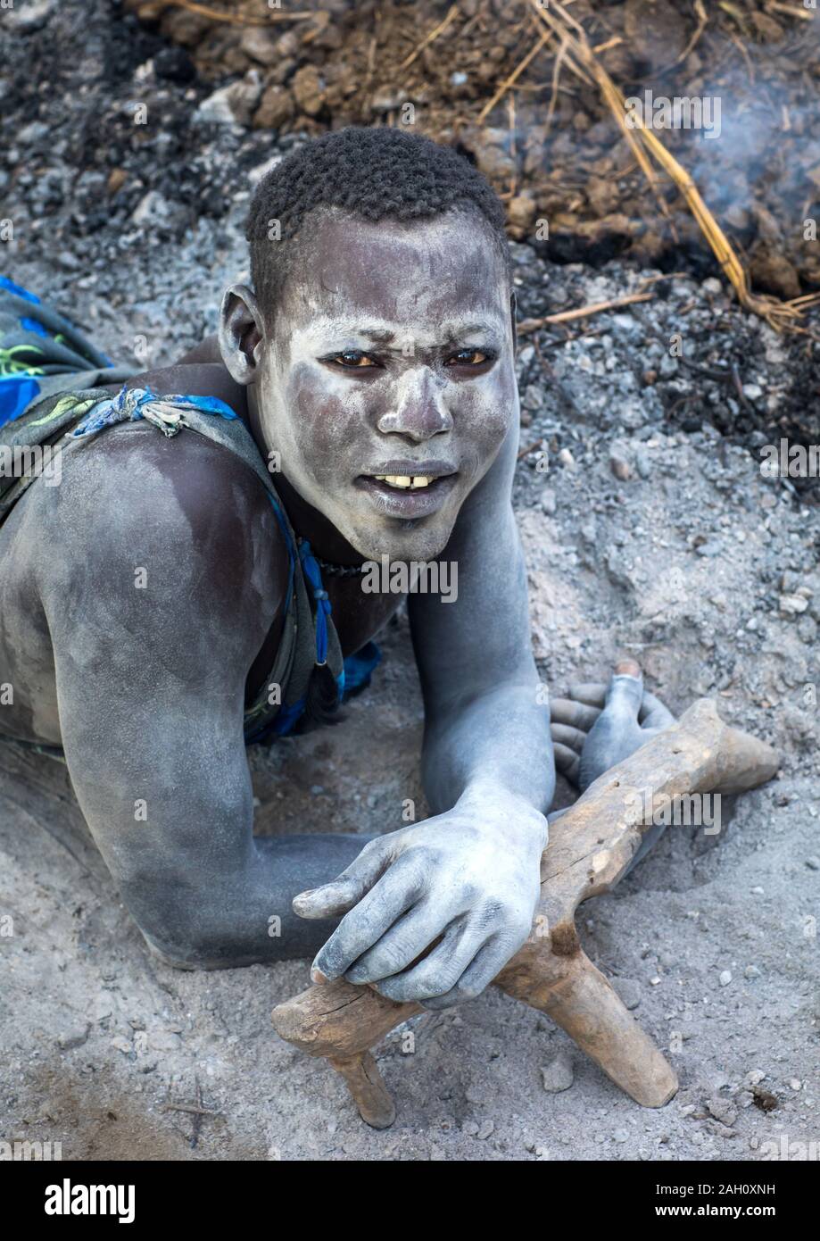 Mundari tribe man covered in ash to repel flies and mosquitoes, Central Equatoria, Terekeka, South Sudan Stock Photo