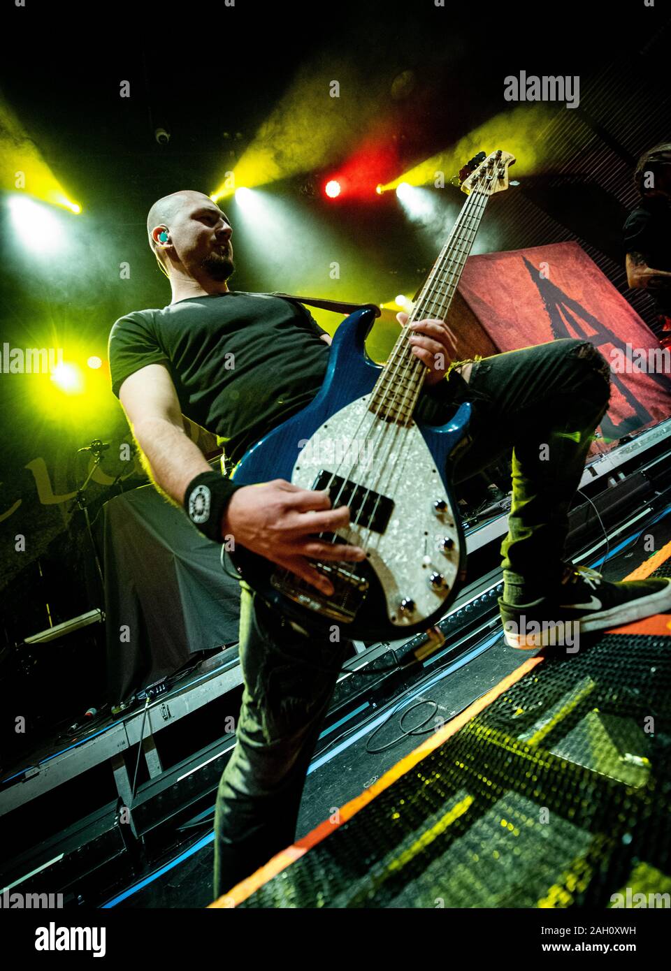 Copenhagen, Denmark. 20th, December 2019. The Moldovan nu metal band Infected  Rain performs a live concert at Amager Bio in Copenhagen. Here bass player  Vladimir Babici is seen live on stage. (Photo