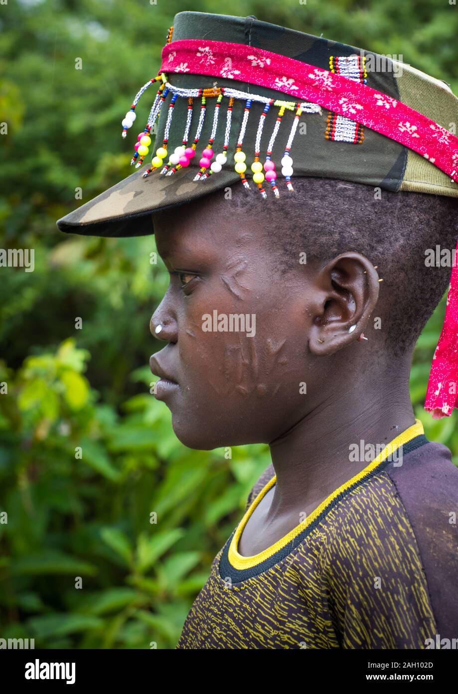 Larim tribe boy with scarifications on the cheek, Boya Mountains, Imatong, South Sudan Stock Photo