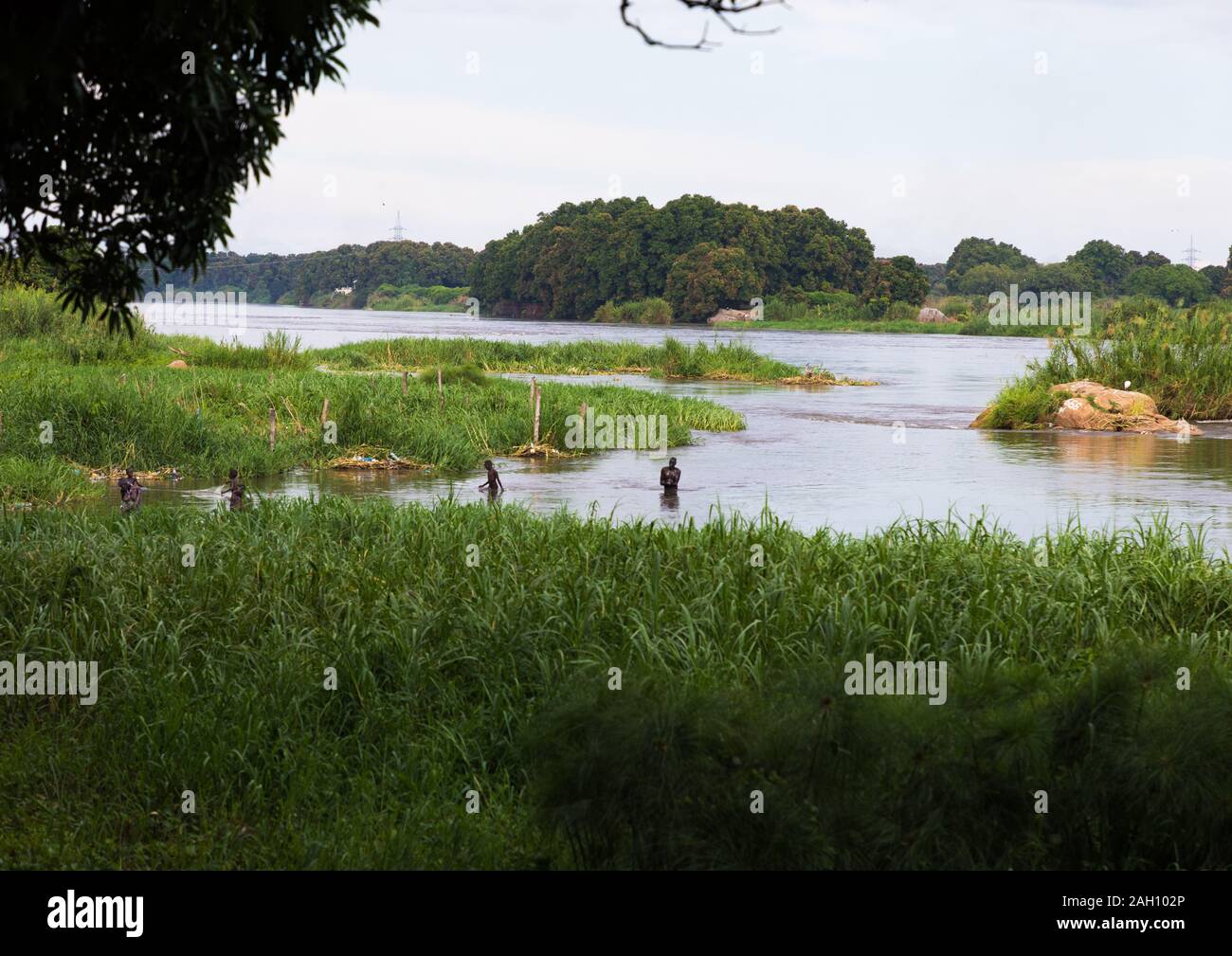 Local people playing in the waters of the white Nile river, Central Equatoria, Juba, South Sudan Stock Photo