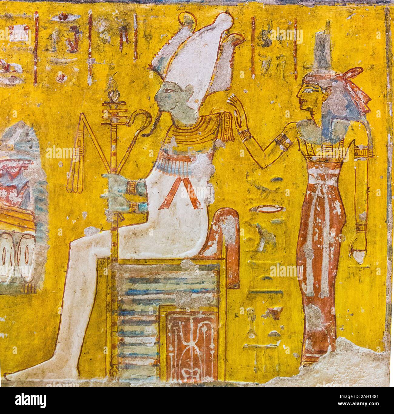 UNESCO World Heritage, Thebes in Egypt, Valley of the Nobles, tomb of Neferronpet. The god Osiris, seated on a throne, followed by the goddess Isis. Stock Photo