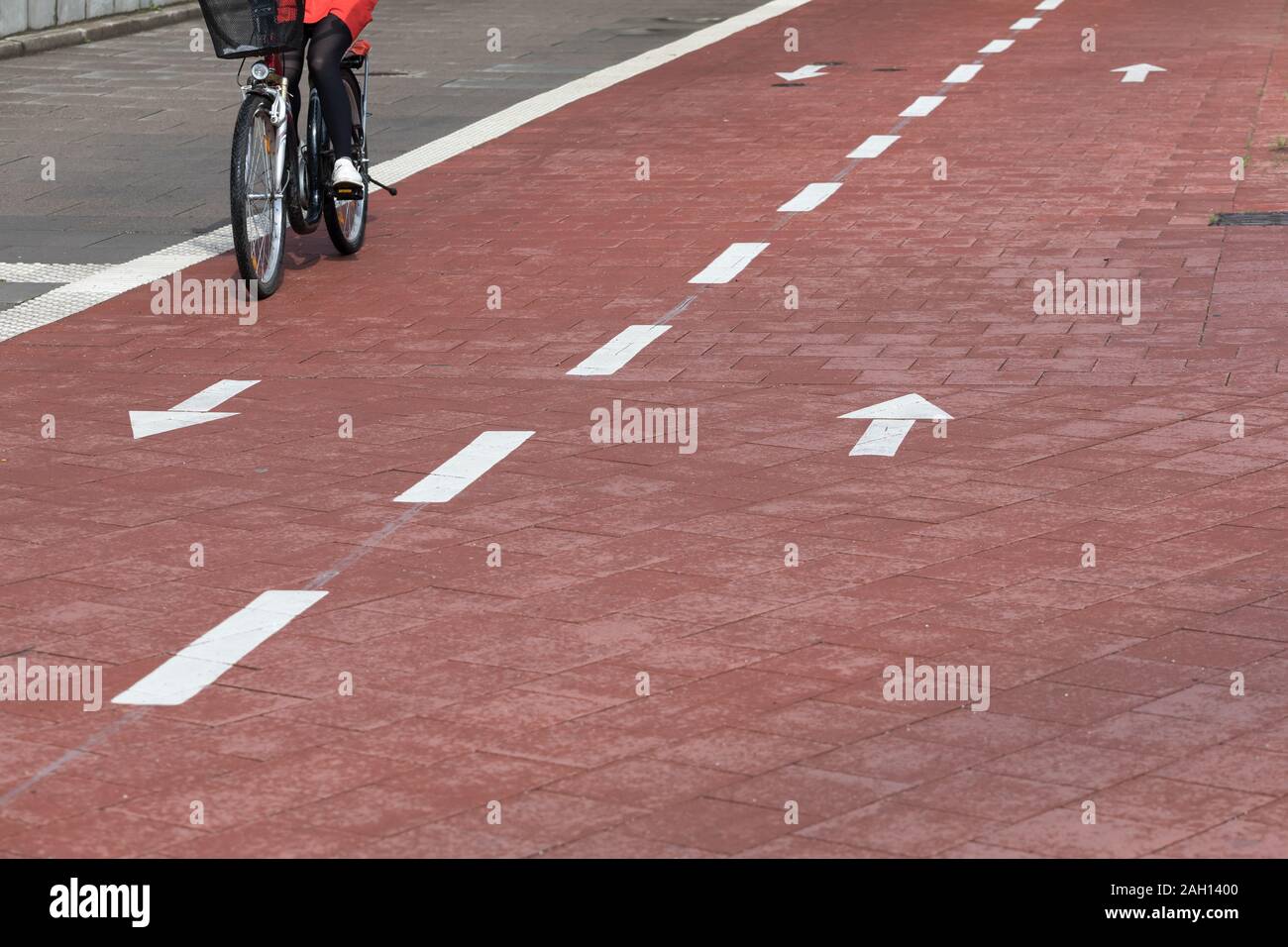 cyclist on two lane cycle path Stock Photo