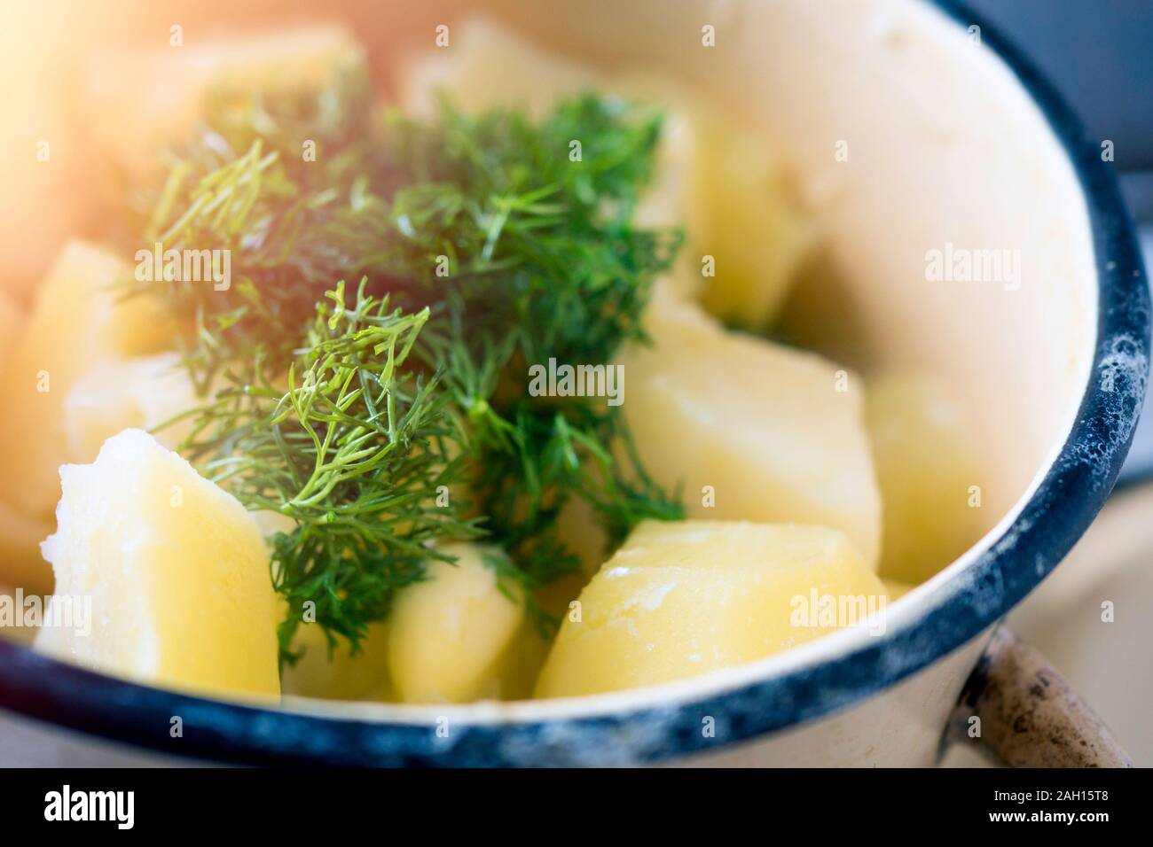 Boiled potatoes in a pan with dill Stock Photo Alamy