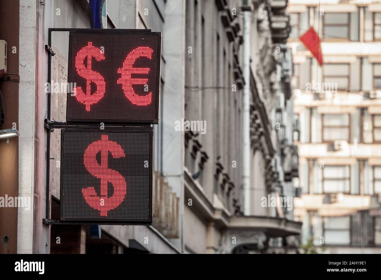 US Dollar and Euro currency symbols on display in front of an exchange office. Abbreviated EUR and USD, these currencies are among the most traded mon Stock Photo