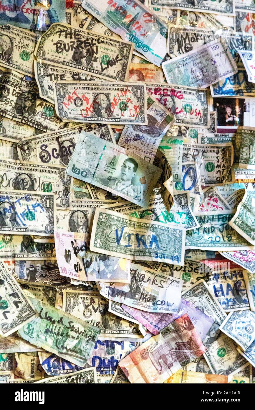 International money notes on the wall at The Brazen Head pub, Dublin, Ireland Stock Photo