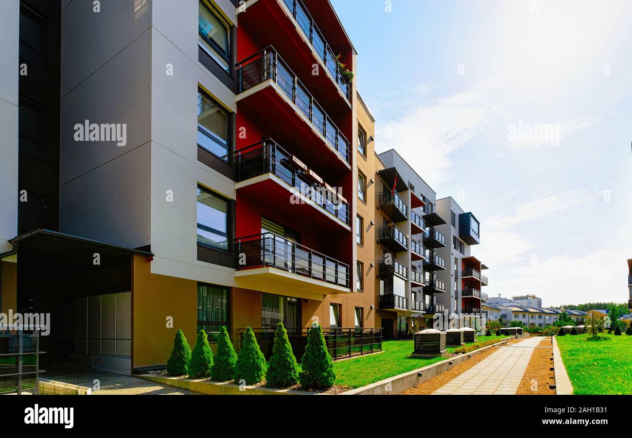 Modern residential apartment building complex with outdoor facility ...