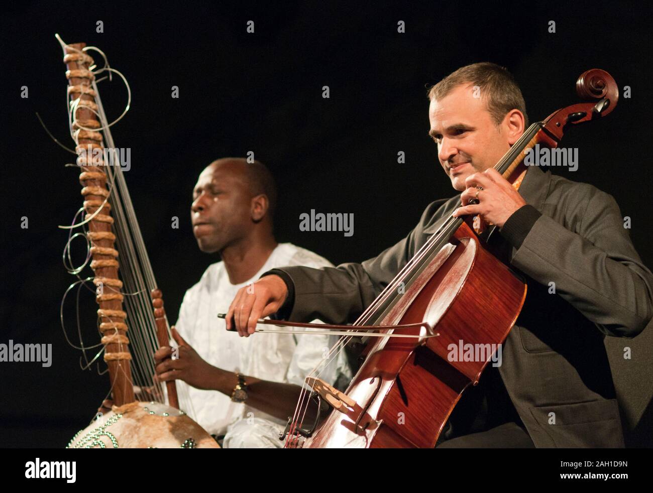 Kora player, Ballake Sissoko and cellist, Vincent Segal performing at the Womad Festival, UK, 2011 Stock Photo