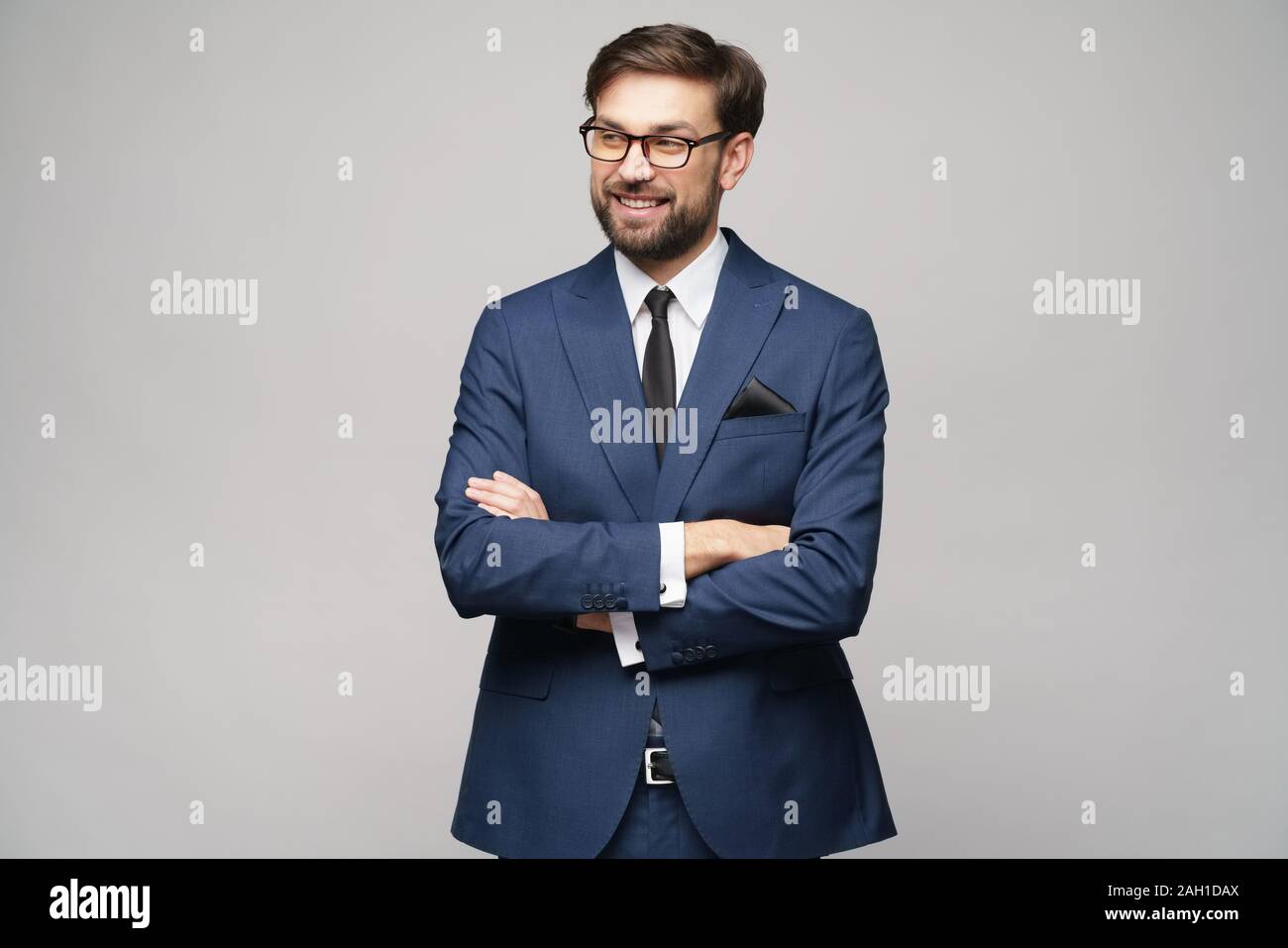 studio photo of young handsome businessman wearing suit Stock Photo - Alamy