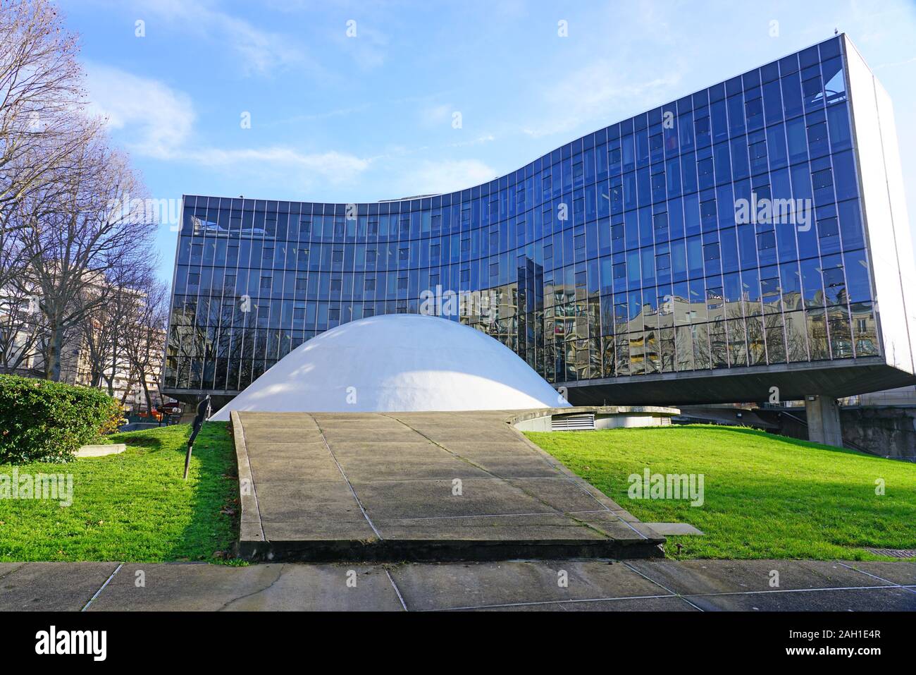 PARIS, FRANCE -18 DEC 2019- Designed by Oscar Niemeyer, the headquarters of the French Communist Party (Siege du Parti Communiste Francais PCF) is loc Stock Photo