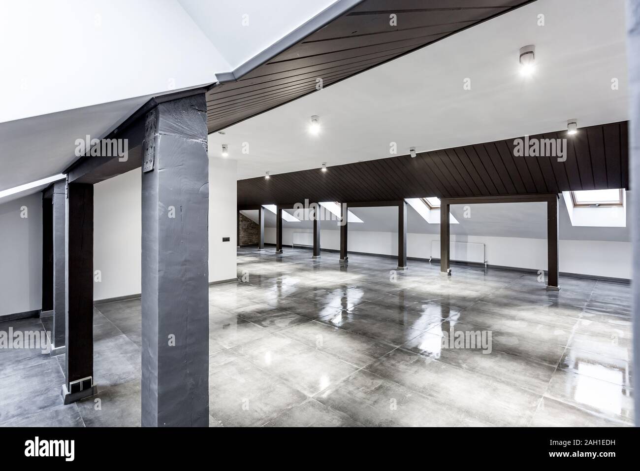 Empty Unfurnished Loft Mansard Room Interior With Wooden