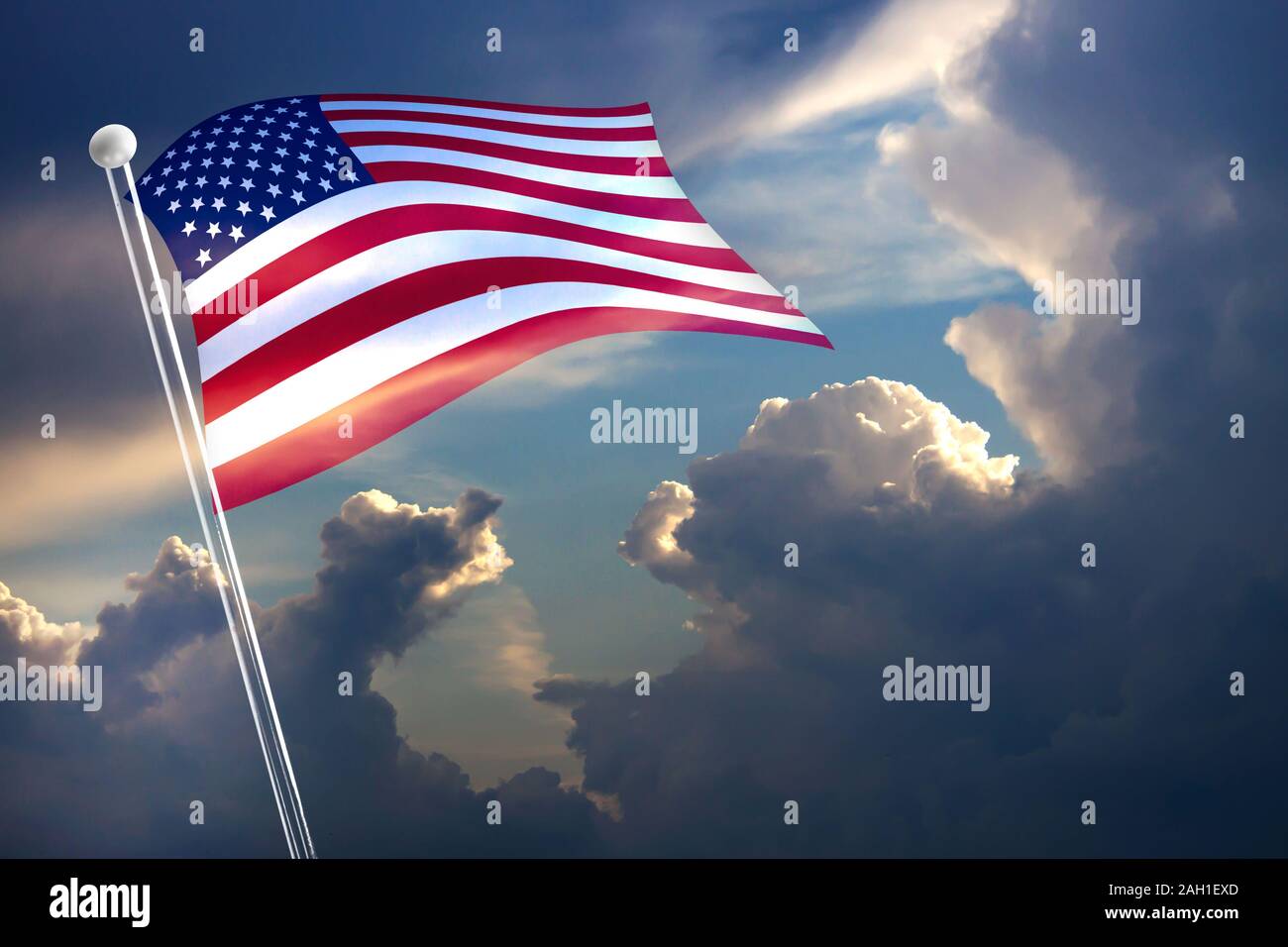 American flag waving in the wind on blue sky background Stock Photo - Alamy