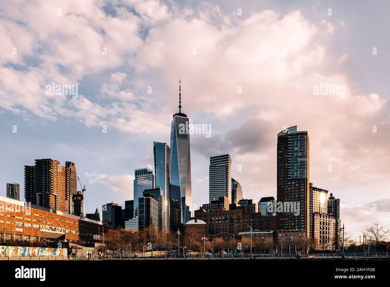 New York City - USA - Mar 19 2019: One World Trade center and skyscapers view from Pier 26 Tribeca at sunset Stock Photo