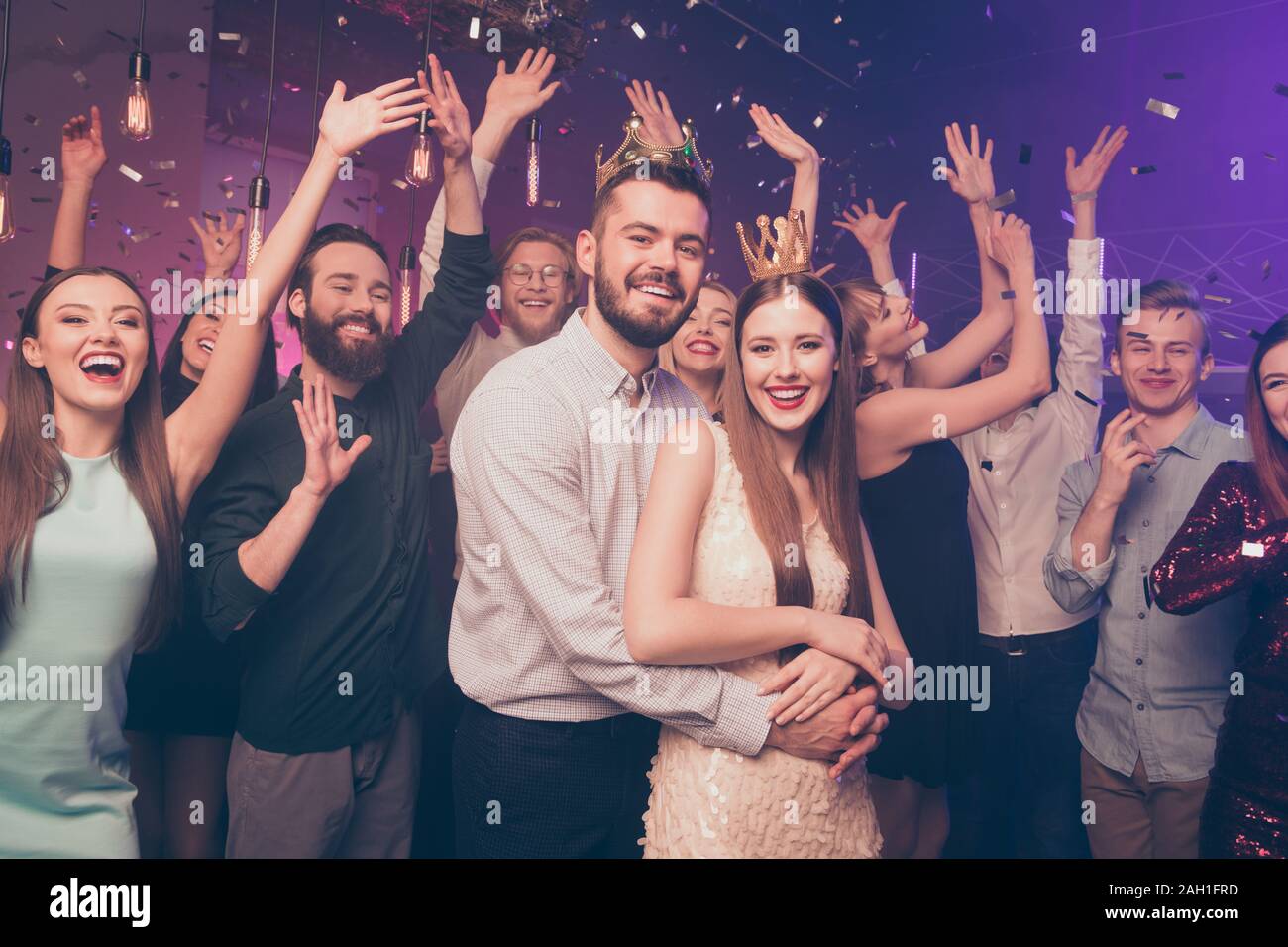 Portrait of charming high-school buddies funny meeting screaming raisisng hands arms palms Stock Photo