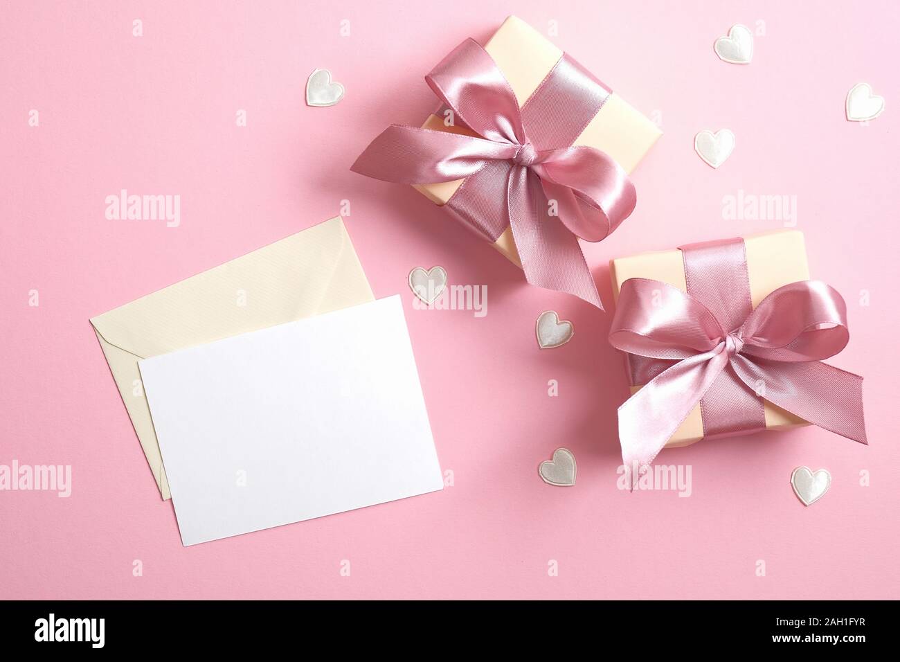 Download Romantic Love Letter With White Paper Note Mockup And Two Gift Boxes With Ribbon Bow On Pink Background Decorated Valentine S Hearts Minimal Flat Lay Stock Photo Alamy PSD Mockup Templates
