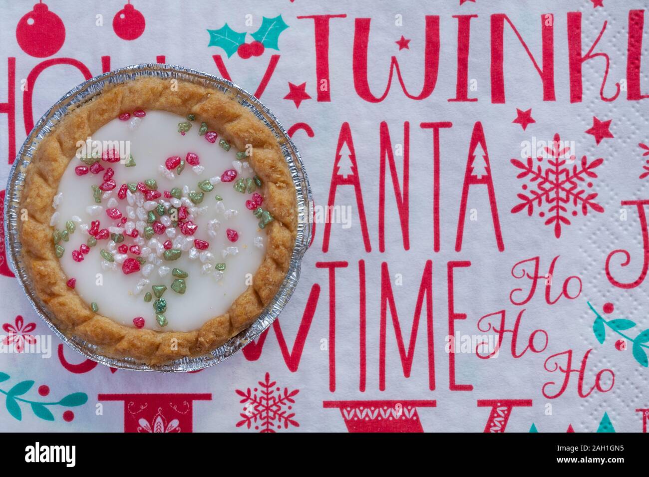 Mr Kipling Festive Bakewells bakewell tart exceedingly good cakes on  Christmas serviette Stock Photo - Alamy