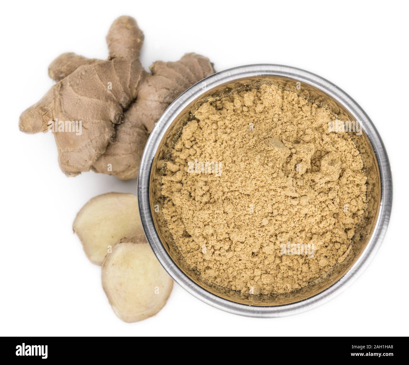 Some Powdered Ginger isolated on white (selective focus) Stock Photo