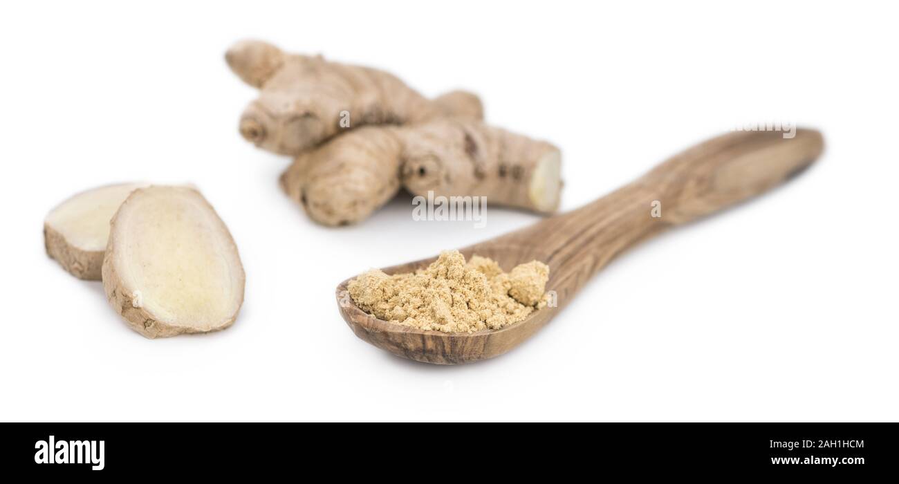 Some Powdered Ginger isolated on white (selective focus) Stock Photo