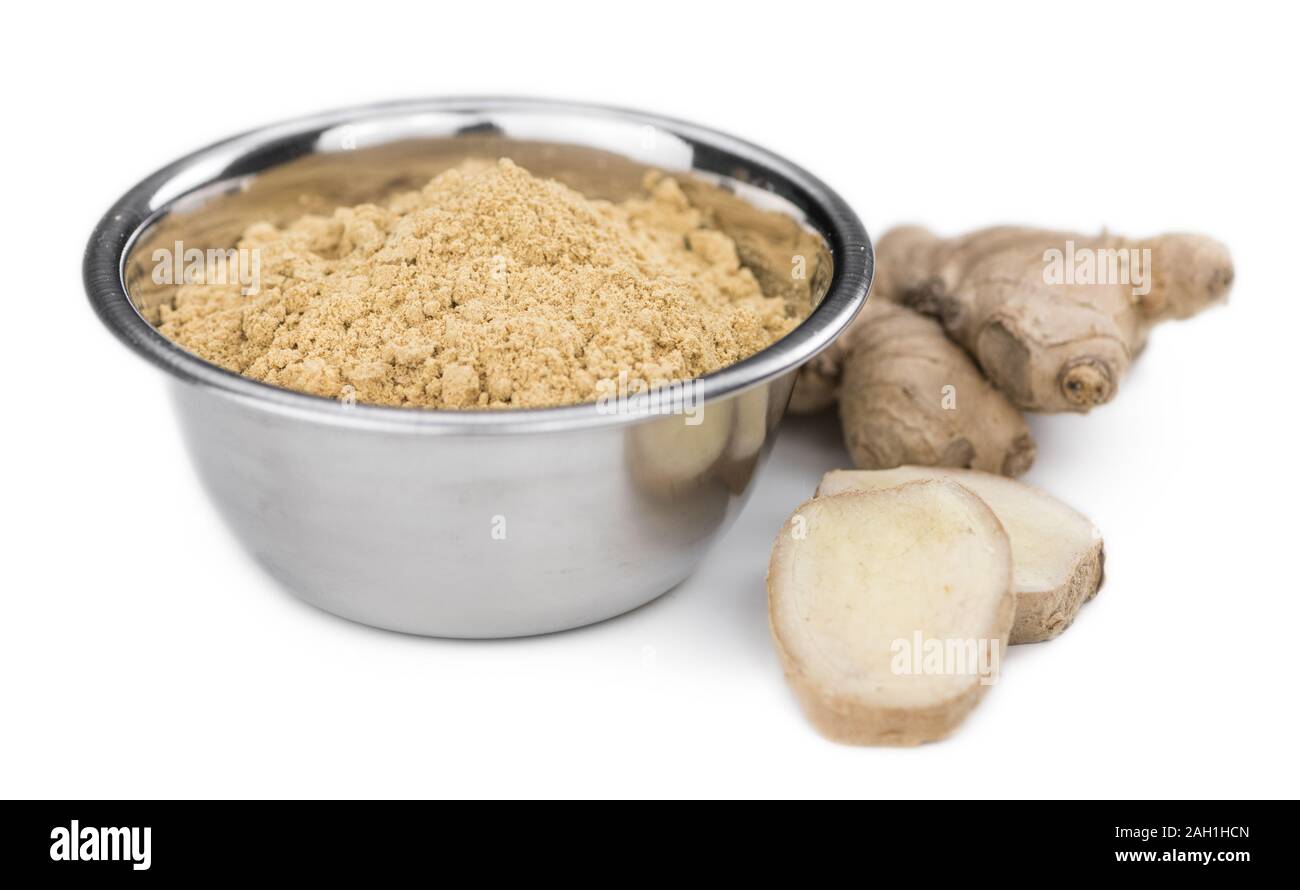 Some Powdered Ginger isolated on white (selective focus) Stock Photo