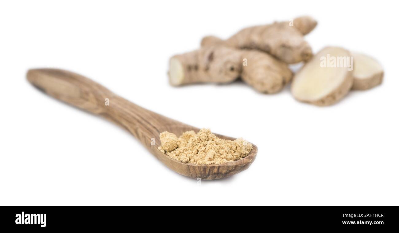 Some Powdered Ginger isolated on white (selective focus) Stock Photo
