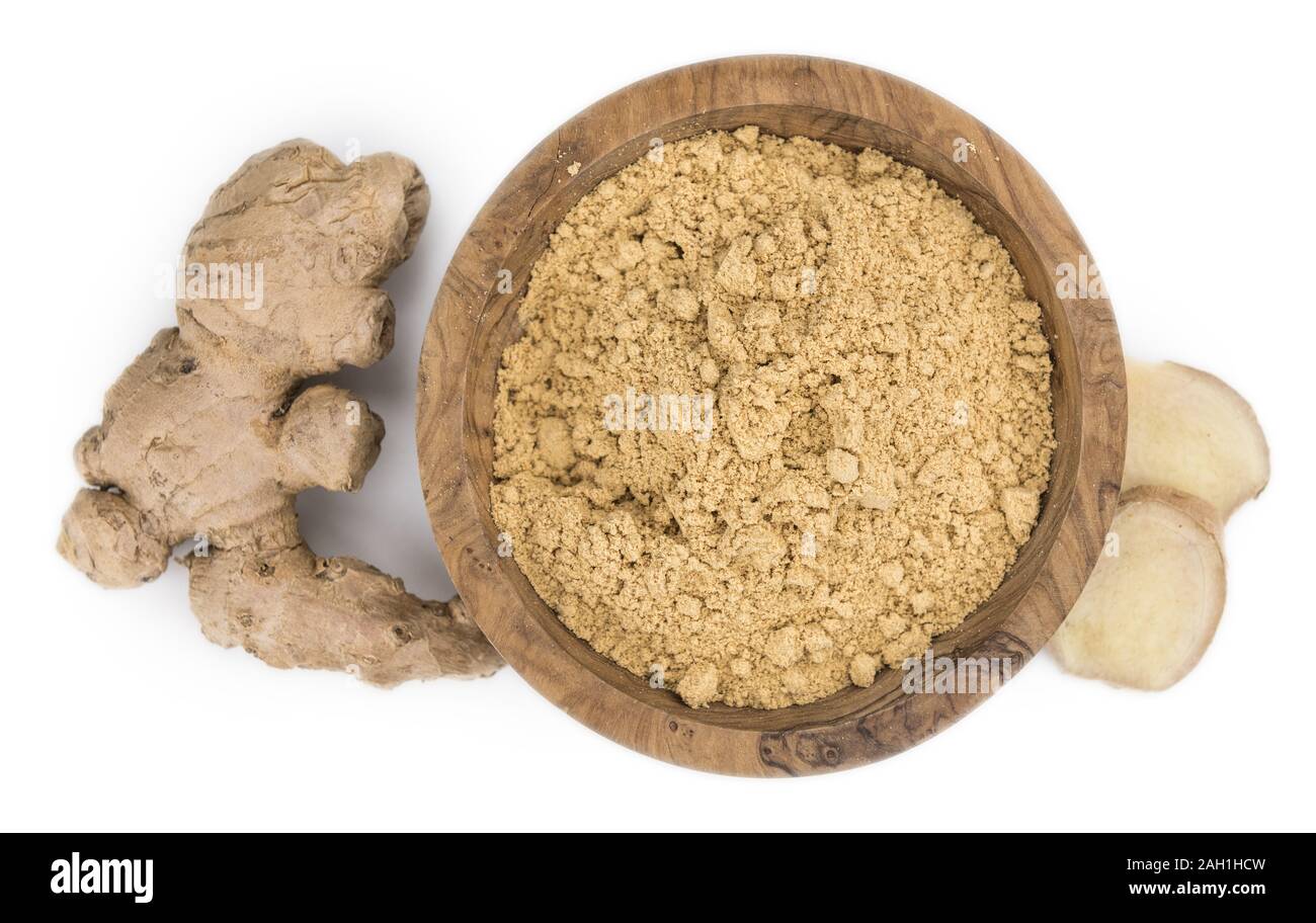 Some Powdered Ginger isolated on white (selective focus) Stock Photo