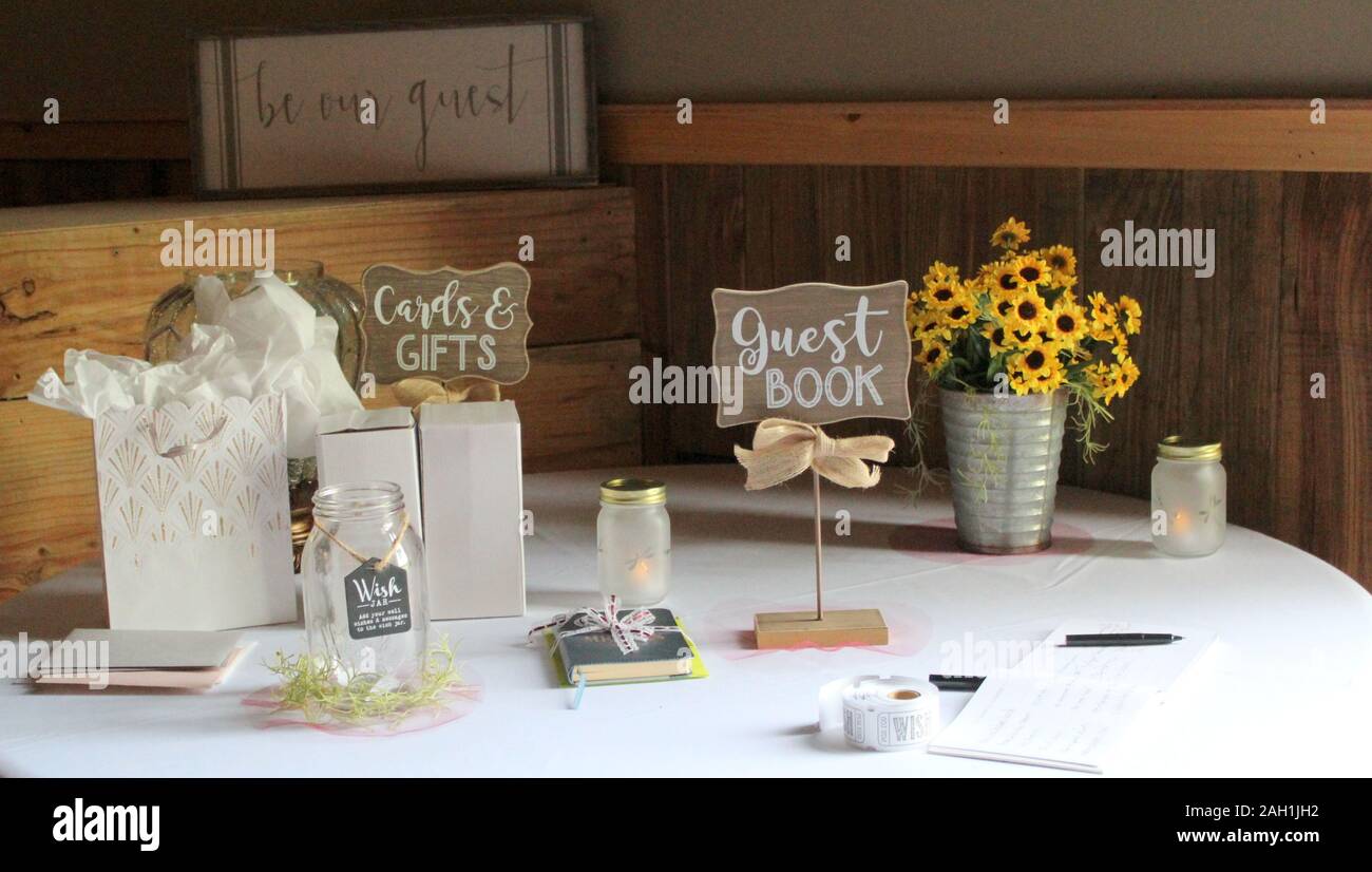 Guest book table with decorations at a rustic wedding Stock Photo