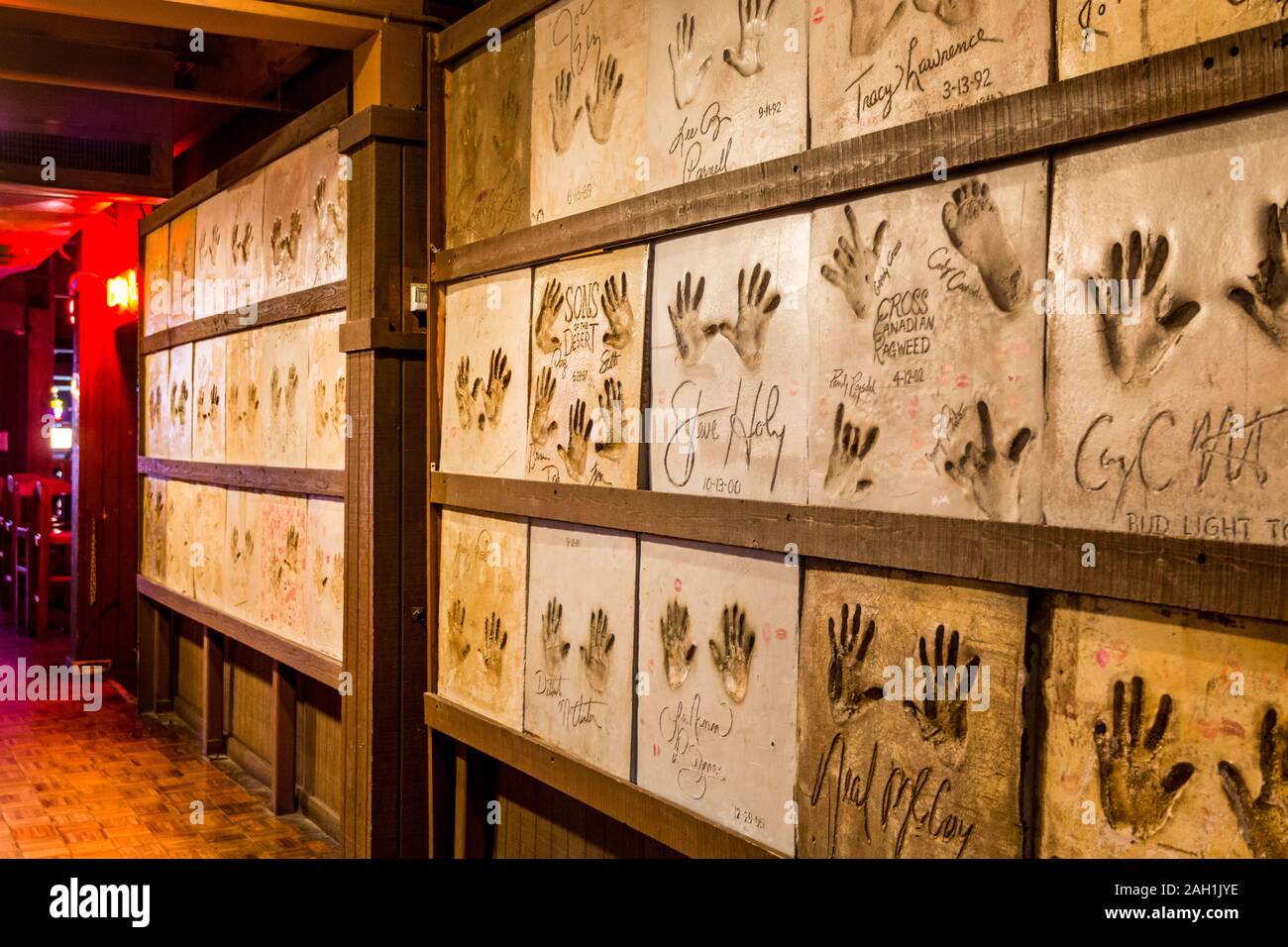 Interiors of  restaurants and bars with a lots of palm print celebrities  at the Fort Worth Stockyards, a historic district that is located in Fort Wo Stock Photo