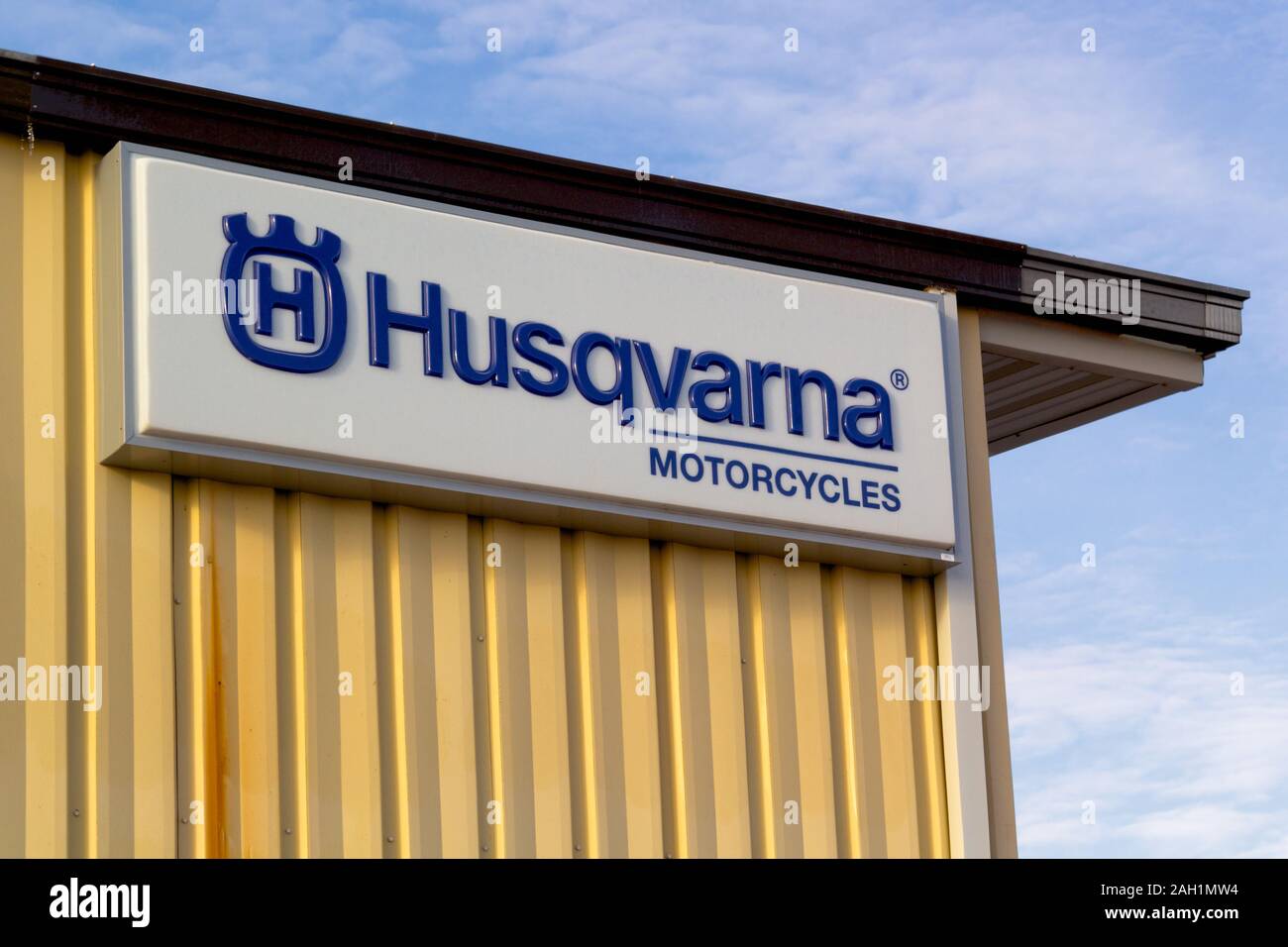 Truro, Canada - December 22, 2019: Husqvarna motorcycles sign. Husqvarna is a Swedish brand operating several companies. Stock Photo