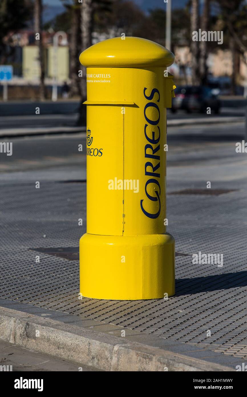 Yellow letterbox in Malaga, Spain Stock Photo Alamy