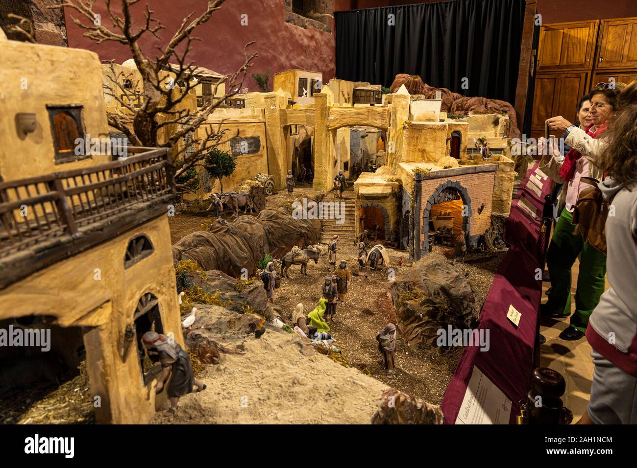 Nativity scene showing the village of Bethlehem with details from the