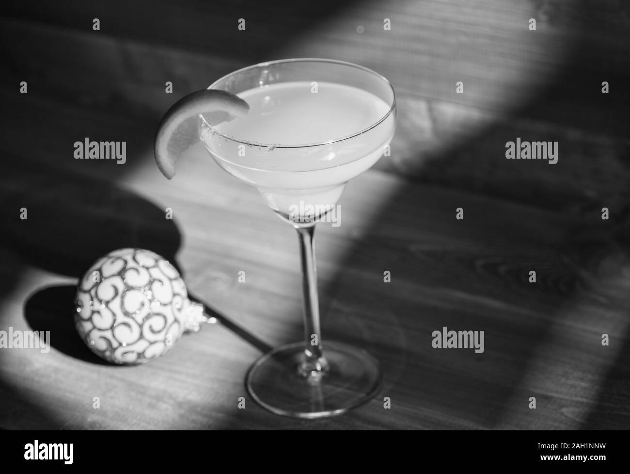 Winter cocktail drink concept. Alcohol cocktail margarita with piece of