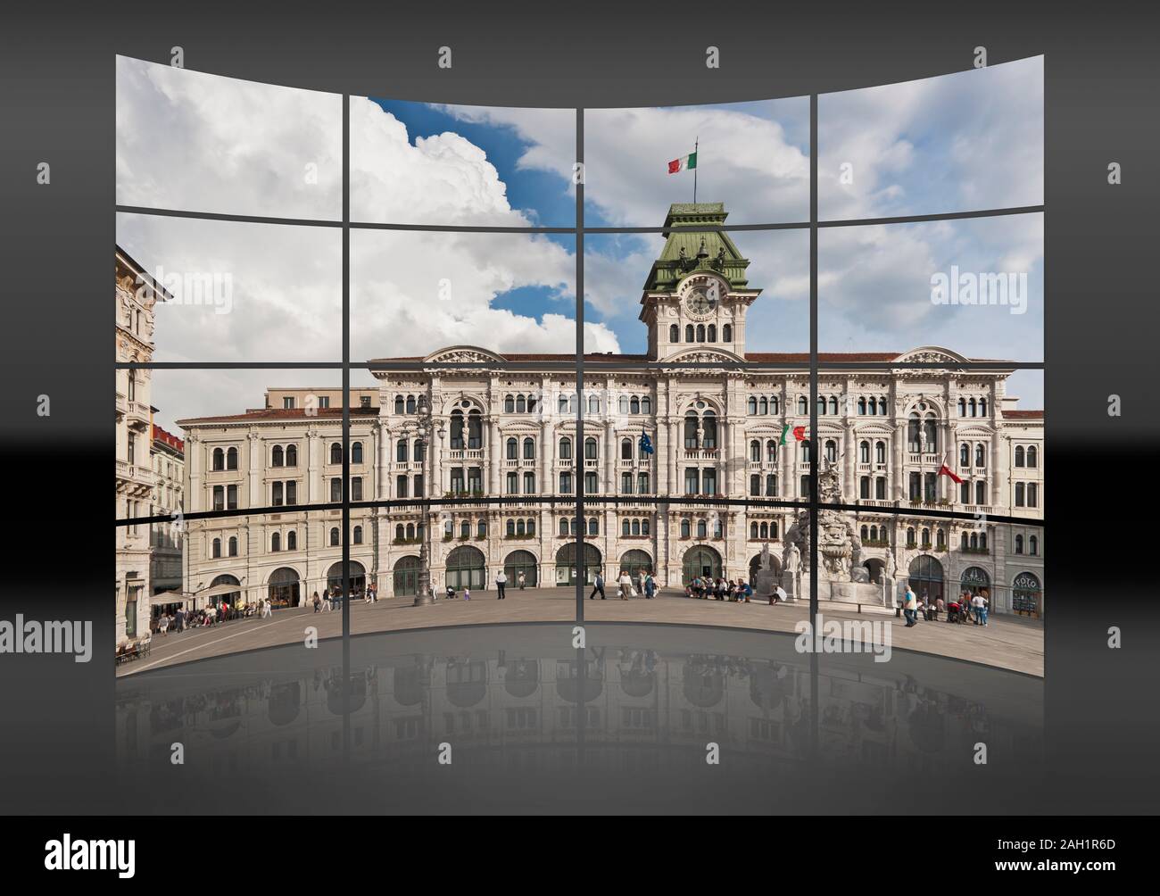 A curved wall. 16 small pictures give a whole picture. The town hall, Palazzo del Muniucipio, is located at Piazza Unita d'Italia (Italian Unity Squar Stock Photo