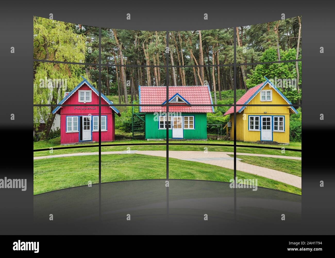 Three colorful wooden houses in the center of Nida, Neringa, Curonian spit, Lithuania, Baltic States, Europe Stock Photo