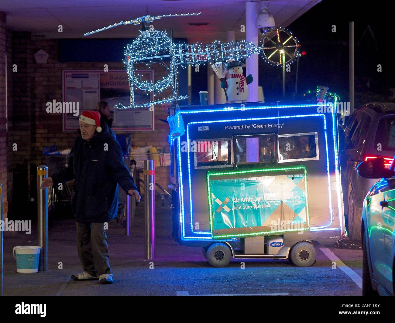 Sheerness, Kent, UK. 23rd Dec, 2019. A mobility scooter decorated in